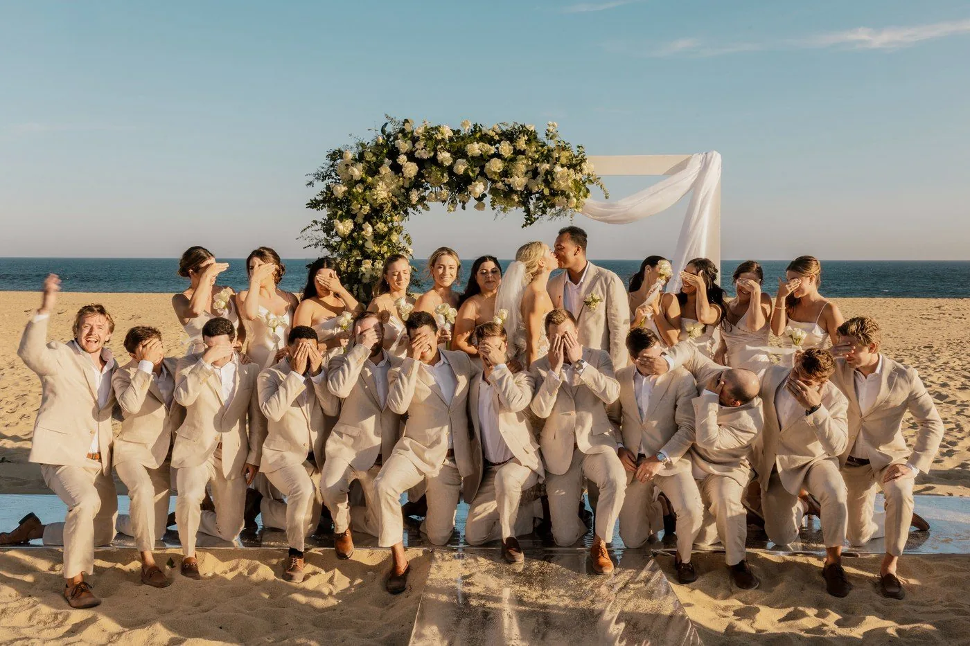 Wedding party walking Cabo San Lucas beach — Ana Badillo Photography