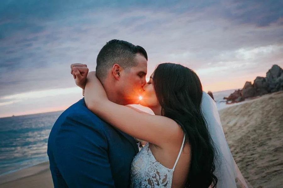 Sun flare kiss at Cabo San Lucas sunset — Ana Badillo Photography