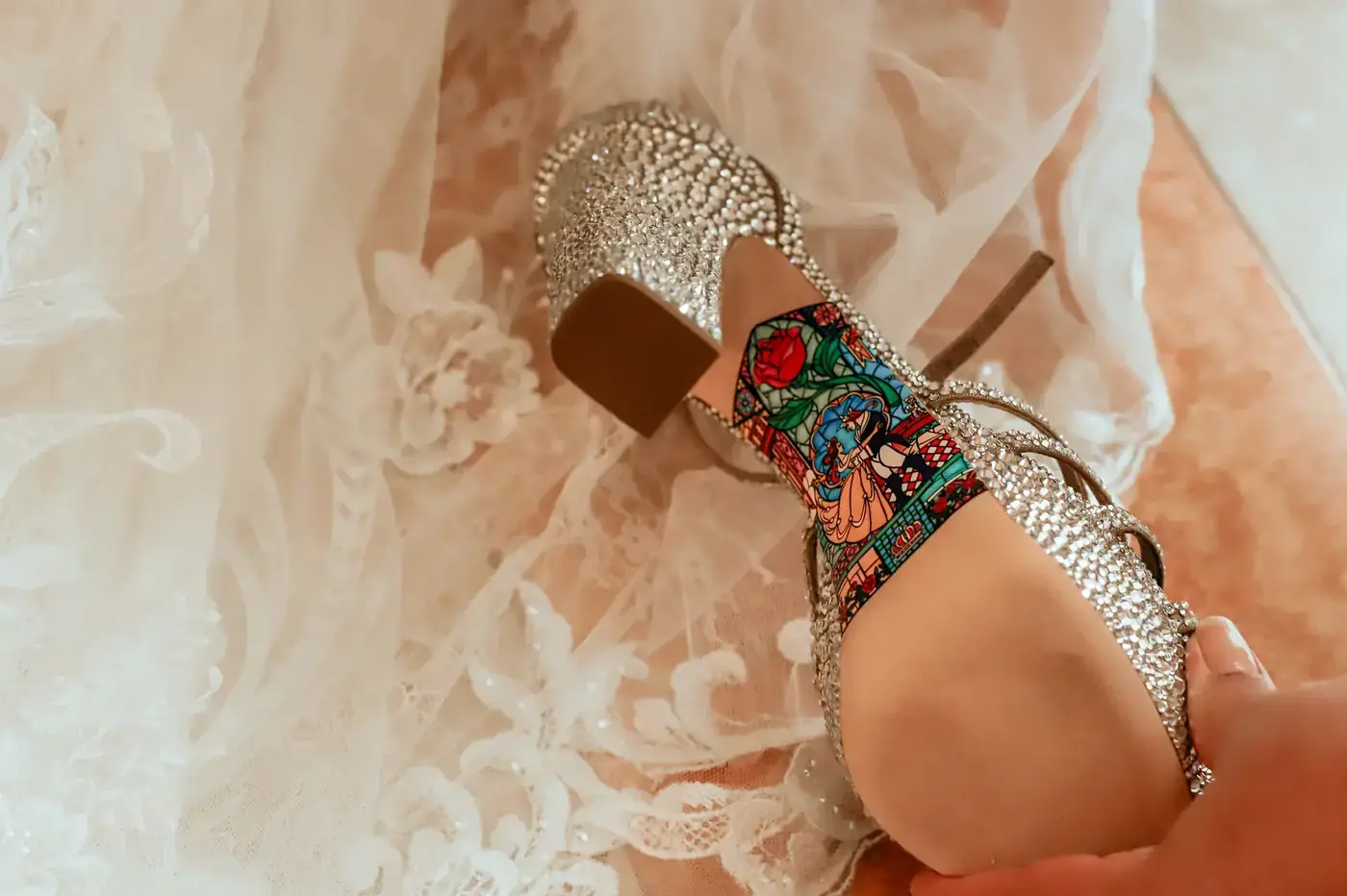 Bridal shoes with rhinestone and stained-glass detail before a Cabo San Lucas wedding