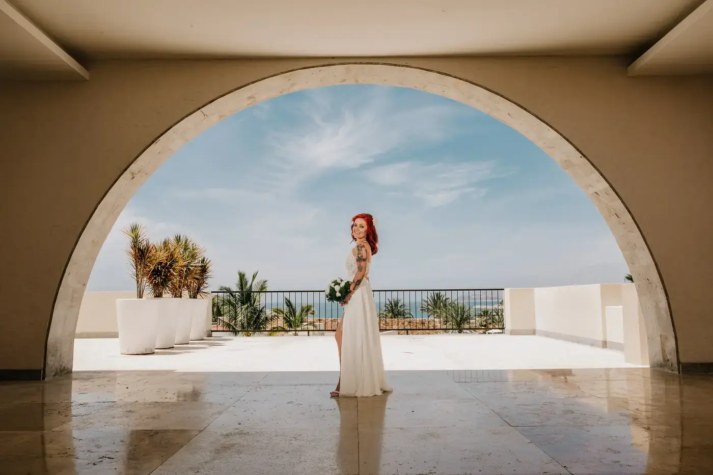 Beach wedding ceremony at sunset in Cabo San Lucas by Ana Badillo Photography