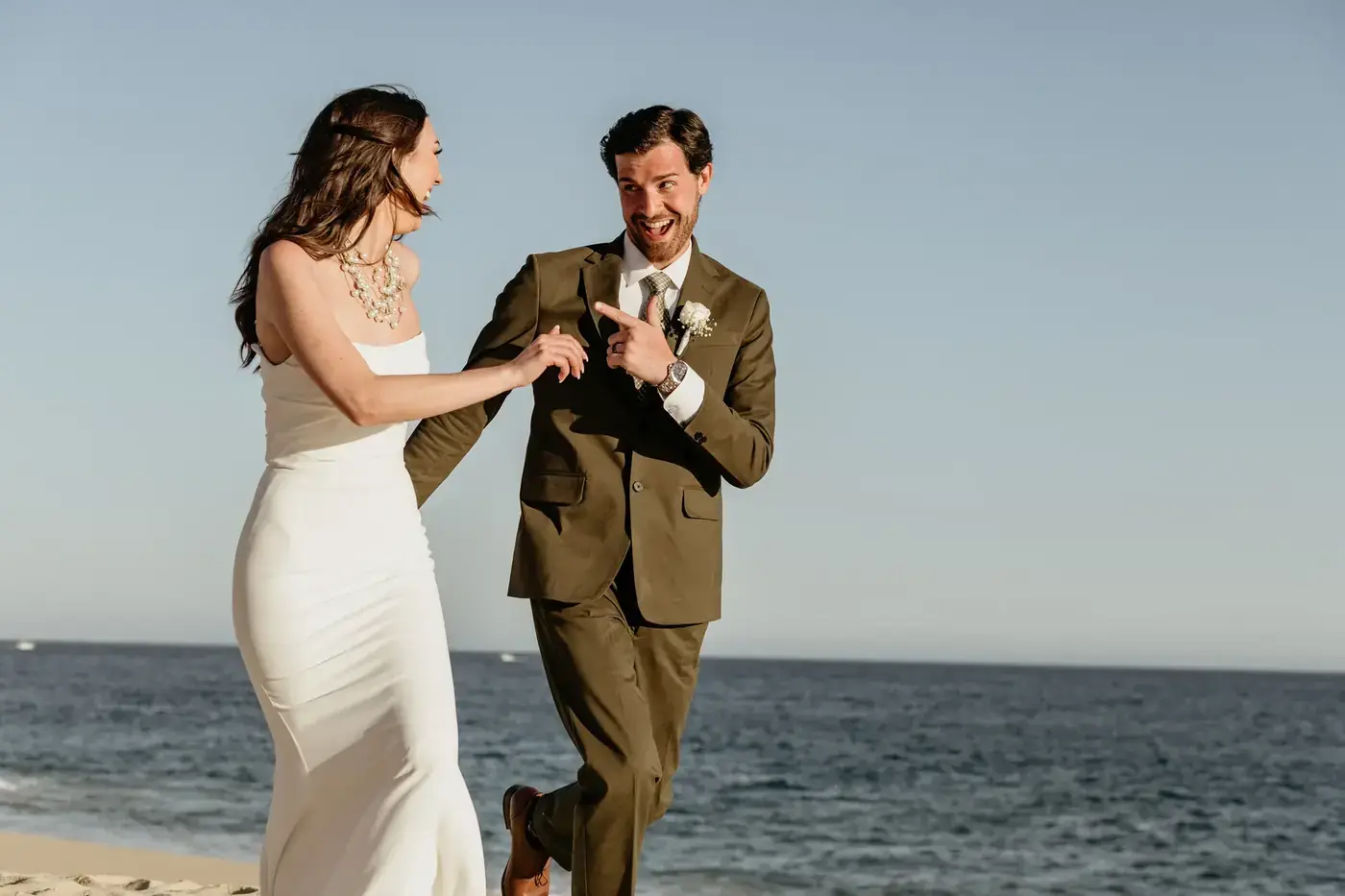 Laughing couple at a Cabo wedding
