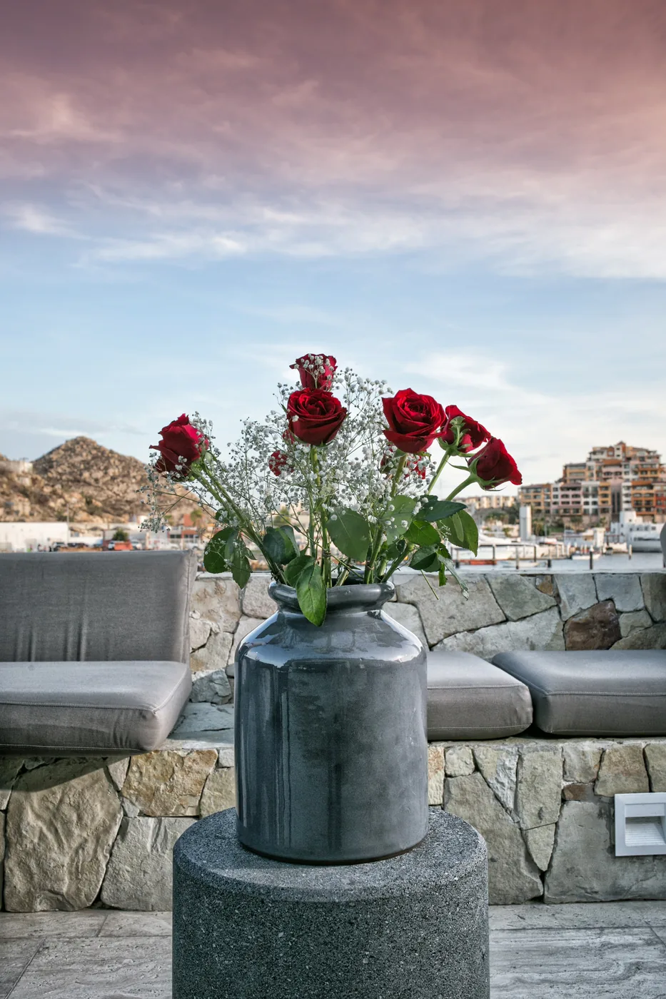 Flowers and candles on a proposal table at Breathless Cabo San Lucas