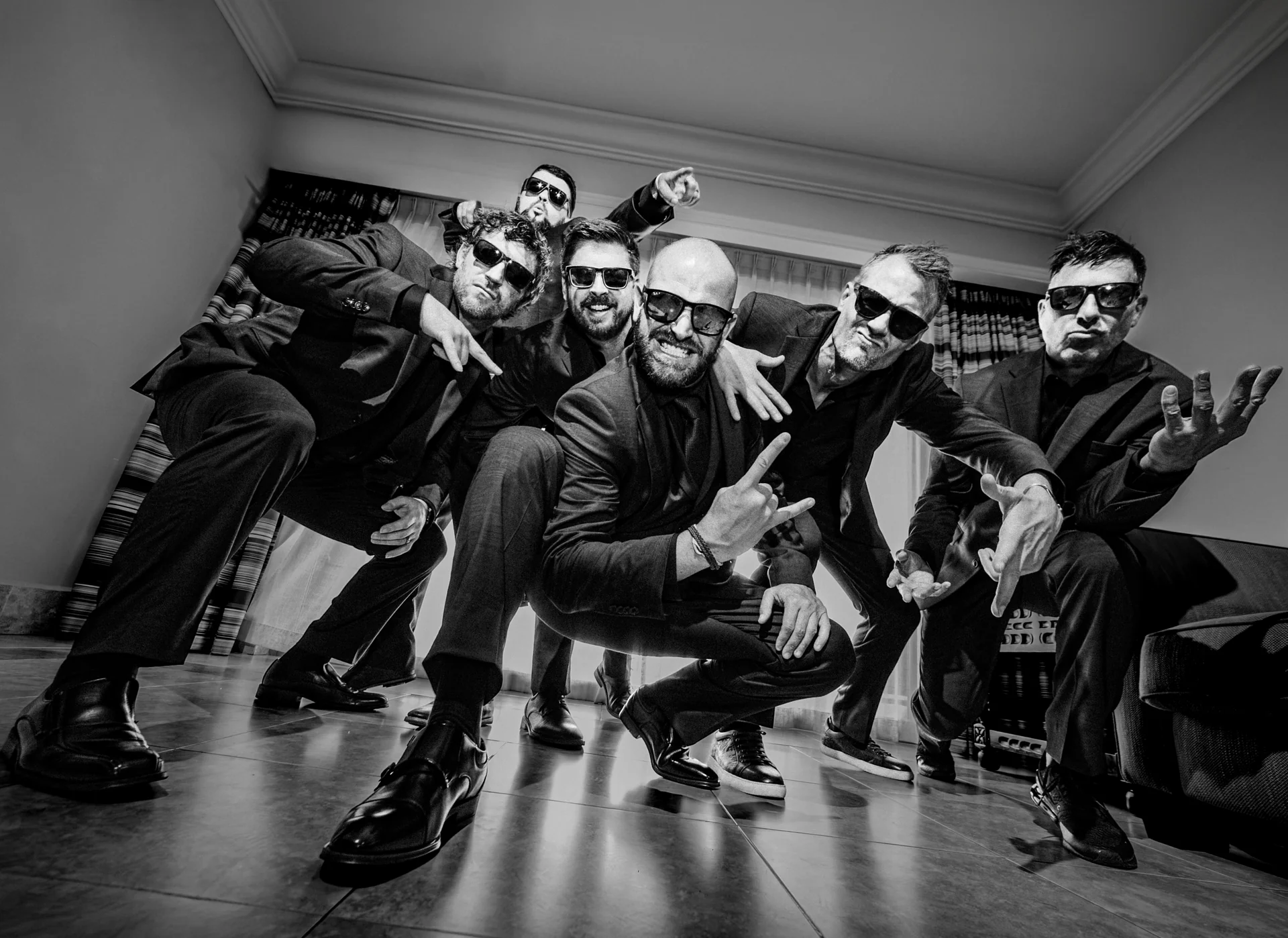Groomsmen celebrating before a Cabo San Lucas wedding