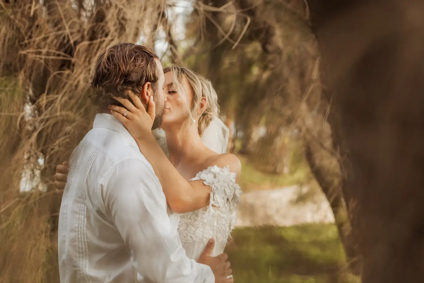 Couple kissing in golden light, Los Cabos couples session