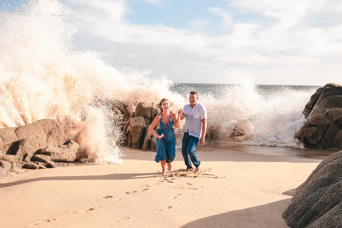 Family with children and crashing waves, Los Cabos family session