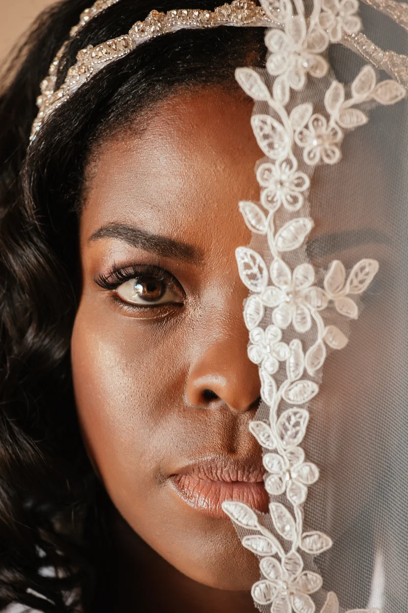 Bride wearing a lace veil at an elopement in Cabo San Lucas