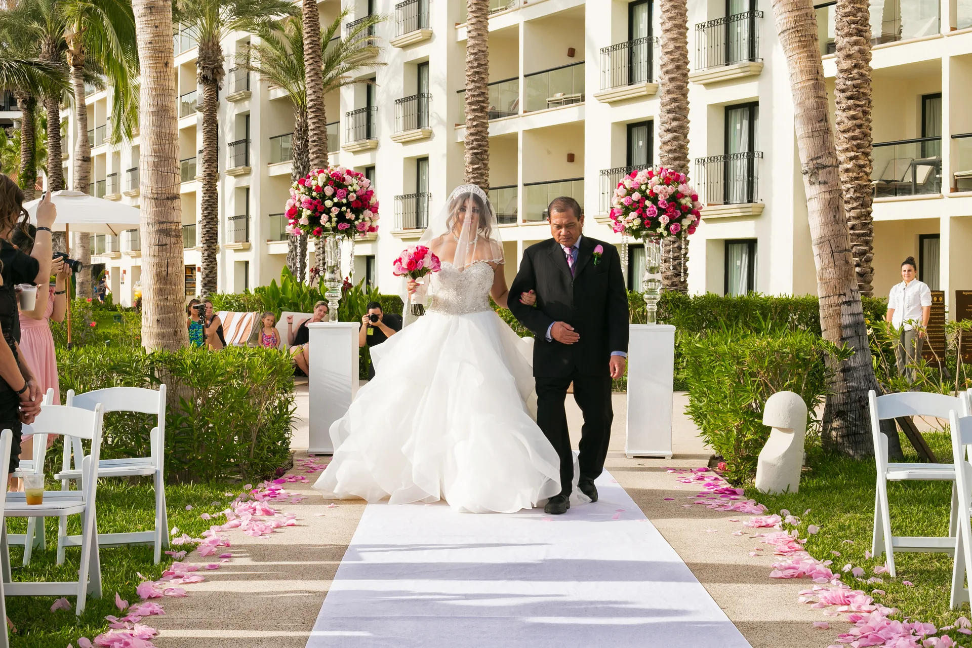 Bride walking down the aisle at a Hyatt Ziva Los Cabos wedding