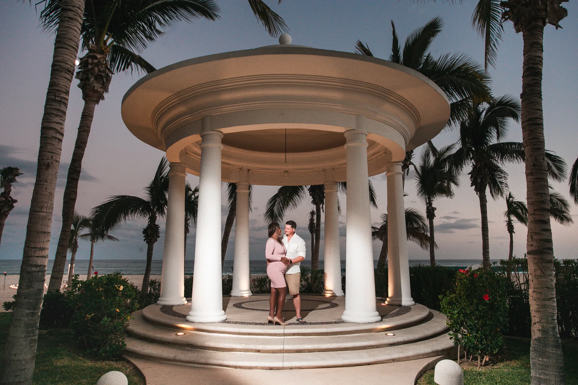 Family portrait under the resort gazebo in Los Cabos