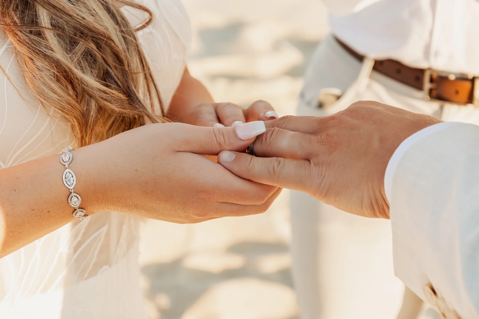 Wedding rings exchanged at Pueblo Bonito Pacífica, Cabo San Lucas wedding