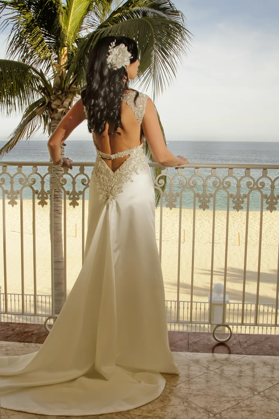 Bride on the balcony at RIU Palace Cabo San Lucas