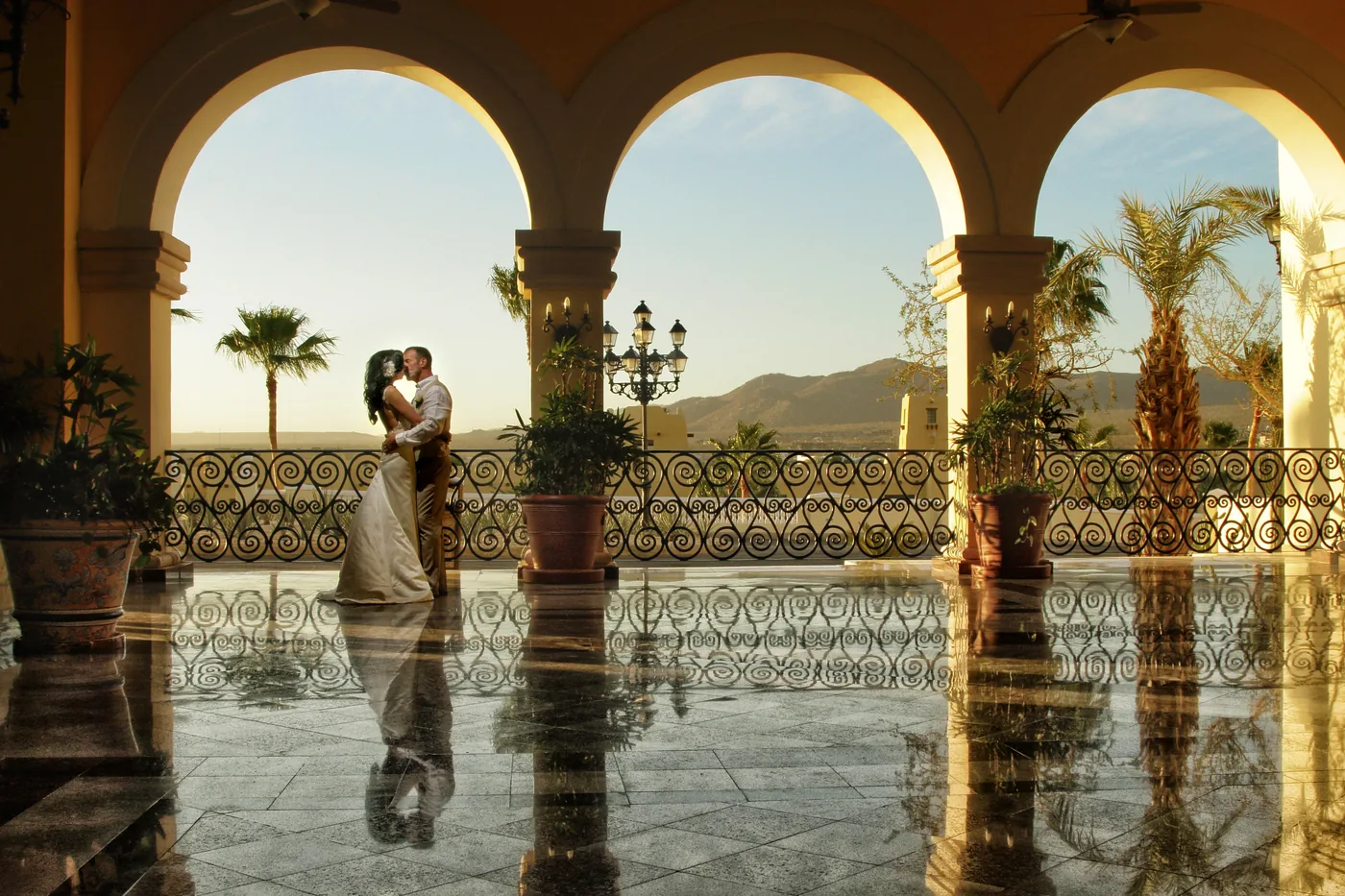 Couple under the arches at RIU Palace Cabo San Lucas