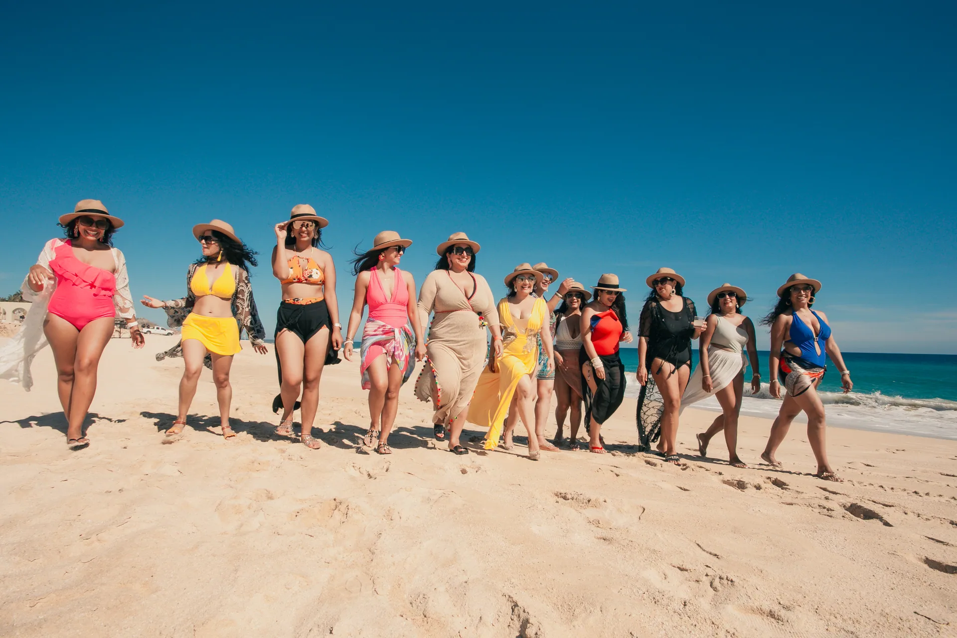 Bride squad walking the beach in Cabo San Lucas