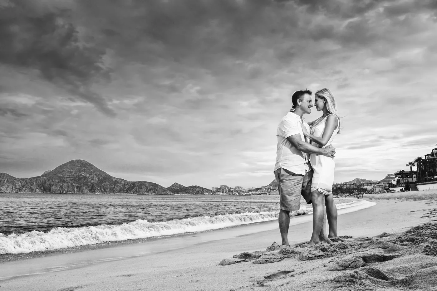 Black and white couple portrait on the beach near Villa del Palmar Cabo